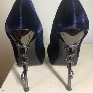 House of Harlow stiletto snake wrapped heels.